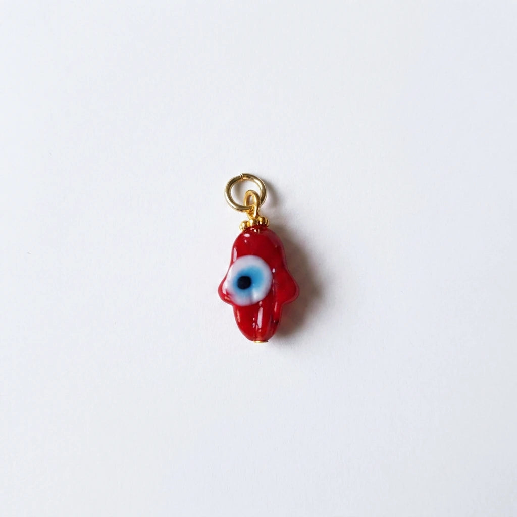 Glass Evil Eye Hamsa Charm by Shukstack – detail view